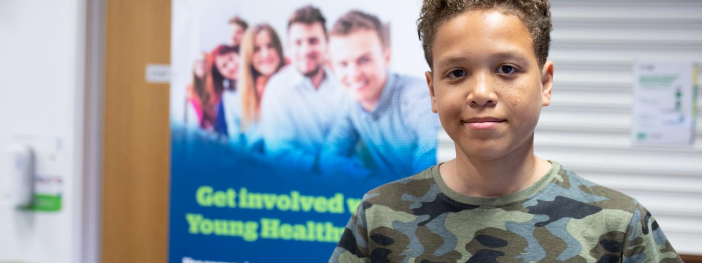 boy looking at camera at Healthwatch event