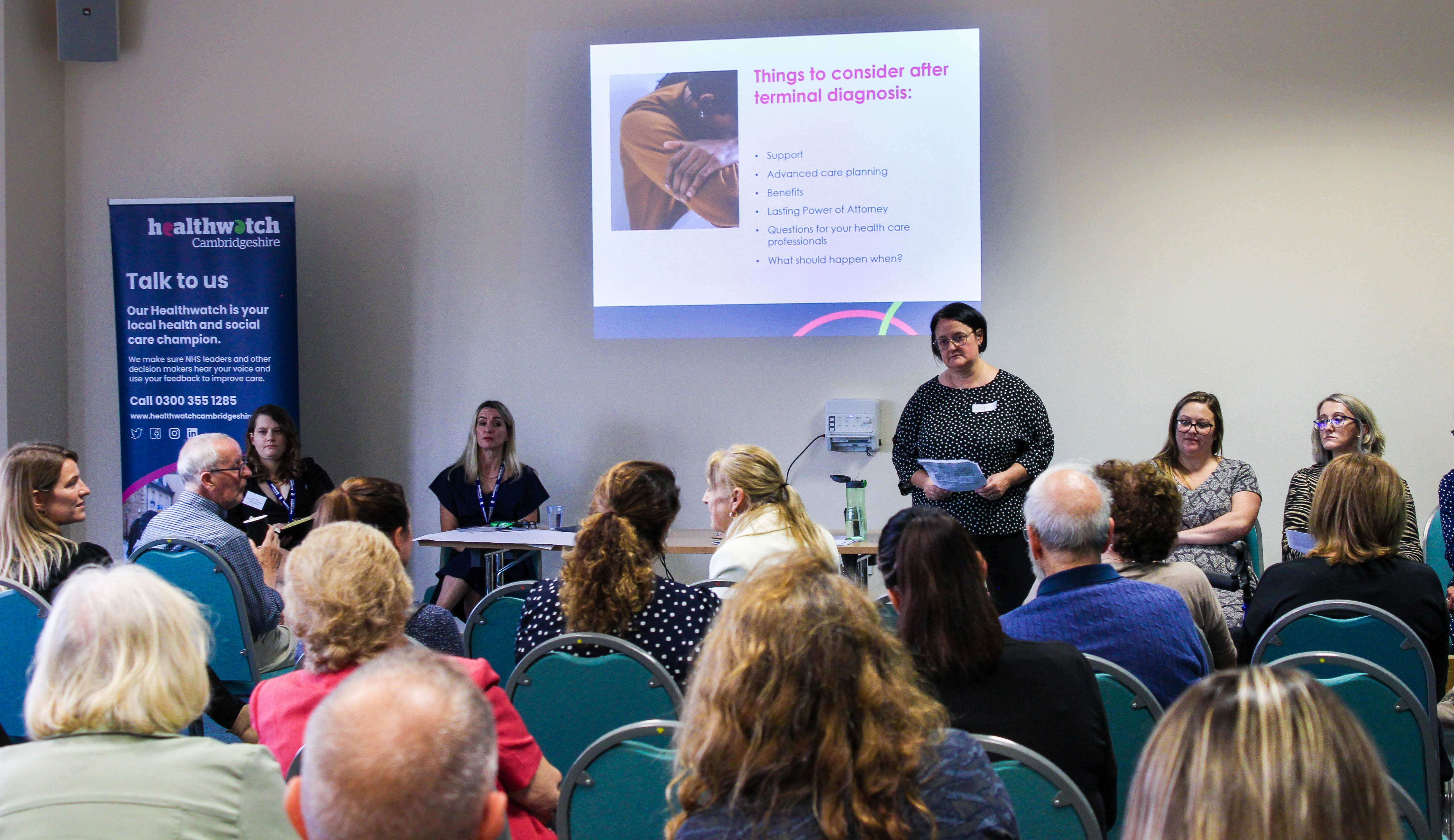 A presentation being given by a speaker at our end of life care workshop