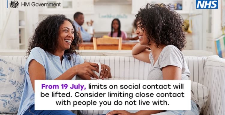 Help to stop the spread of Covid and consider limiting contact with people you don't live with two women chatting