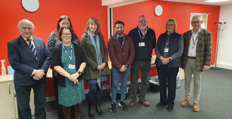 David Croisdale-Appleby, Chair of Healthwatch England (furthest left) meets with our staff and volunteers, and our Chair, Stewart Francis (furthest right).