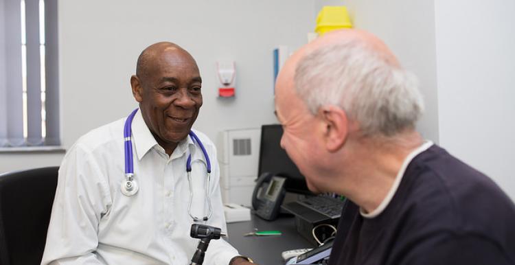 Help the NHS decide on which services and treatments it should fund Man visiting GP surgery