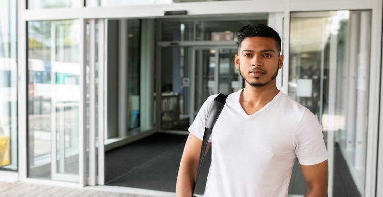 young man looking into camera