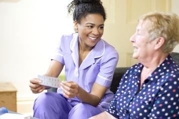 Care worker with patient