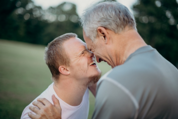 Father and son laughing