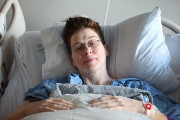 woman patient in hospital bed