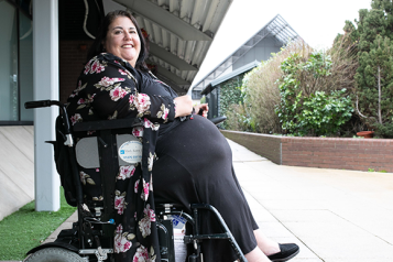 Woman in wheelchair outside