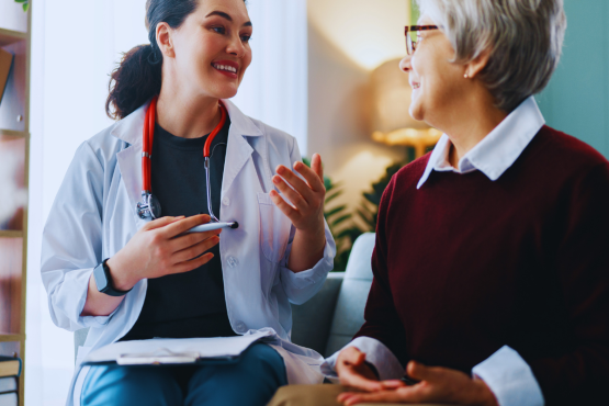doctor talking to woman